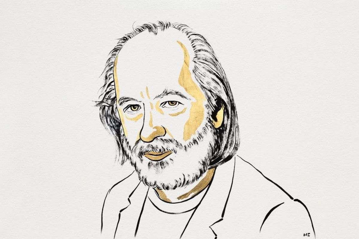 Na szarym tle naszkicowany portret mężczyzny w marynarcez brodą